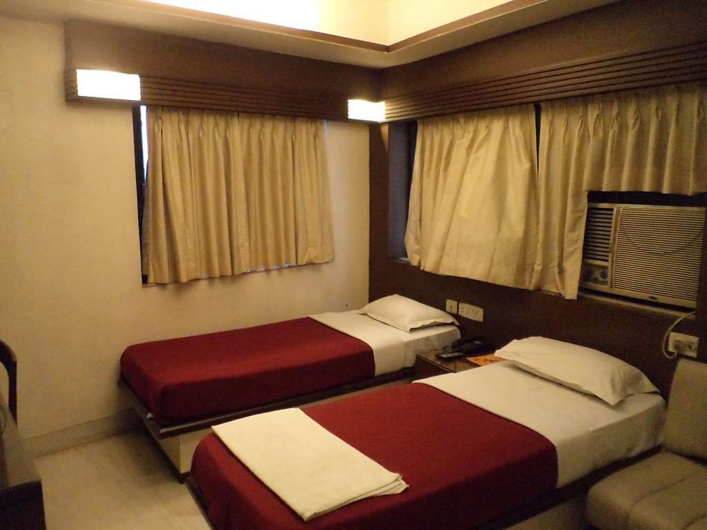 כלכותה Hotel Aston חדר תמונה